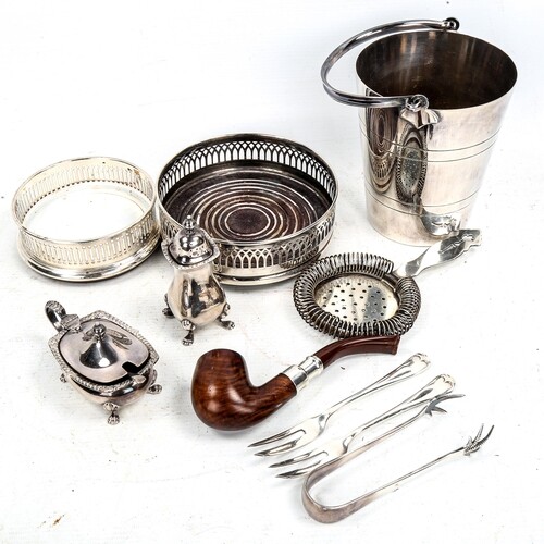A group of plated items, including 2 wine coasters, an ice b...