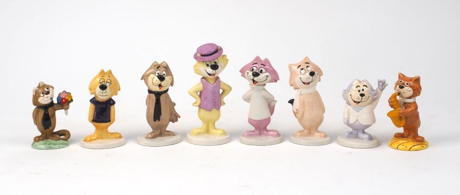 A group of six Beswick Top Cat figures from the exclusive edition of 2000 for the Doulton and Beswick Fairs in England, including Top Cat, 13cm high, Fancy Fancy, Benny, Choo Choo, Spook, and Brain, together with two further Top Cat figures, one...