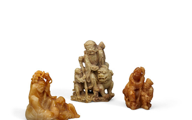 A group of three soapstone carvings