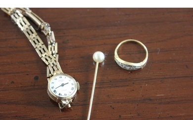 A ladies' 9ct gold "Rotary" wristwatch with white enamelled ...