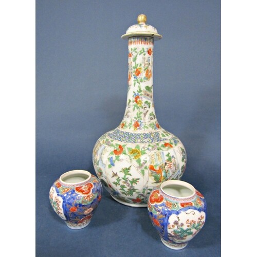 A large 19th century oriental Famille Verte bottle shaped va...