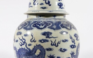 A large chinese blue and white ginger jar wih dragon design and character marks to shoulder H:60cm