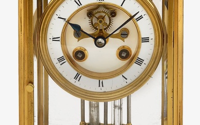 A late 19th century French four glass gilt brass mantle clock