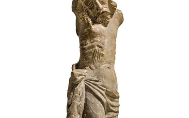 A late Gothic stone sculpture of Christ on the cross