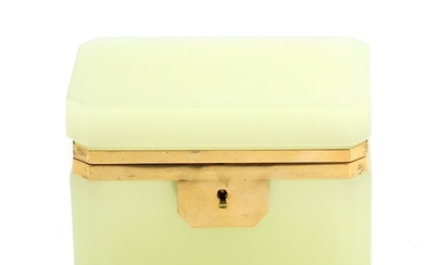 A light green glass sugar casket, rectangular with cut corners, mounted with gilded metal. 20th-21st century H. 10 cm. L. 13.5 cm. W. 8.5 cm.