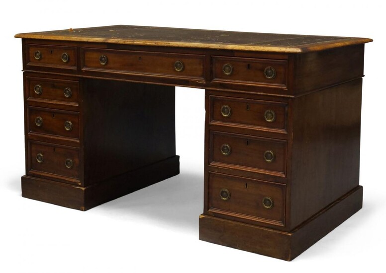A mahogany pedestal desk, early 19th Century, the rounded rectangular...