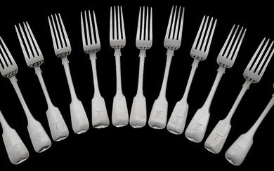 A matched set of twelve silver fiddle pattern table forks