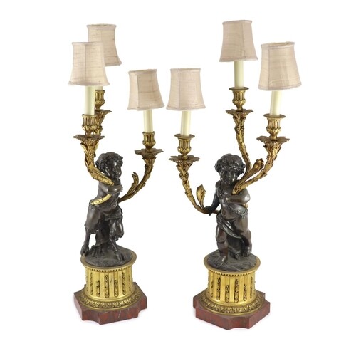 A pair of 19th century French bronze and ormolu three light ...