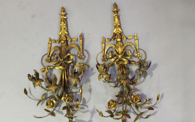 A pair of 20th century giltwood and gesso three-branch wall lights, height 80cm, width 30cm.