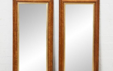 A pair of Continental cushion molded mirrors