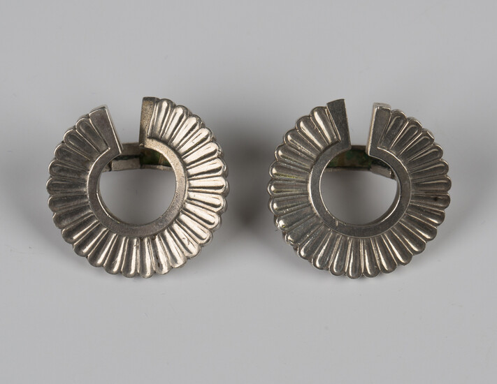A pair of Georg Jensen sterling silver circular earclips, designed by Jorgen Jensen, each formed as