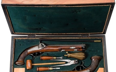 A pair of cased German percussion pistols by Sauer and Son in Suhl, circa 1840