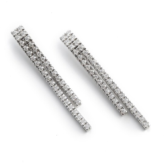 NOT SOLD. A pair of diamond ear pendants each set with numerous brilliant-cut diamonds weighing...