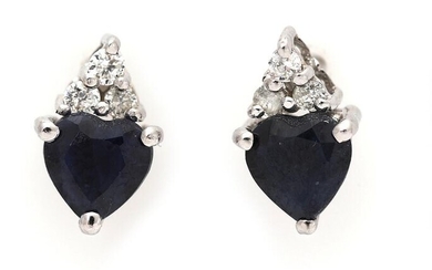 SOLD. A pair of ear studs each set with a sapphire and three diamonds, mounted in 14k white gold. L. app. 9 mm. (2) – Bruun Rasmussen Auctioneers of Fine Art