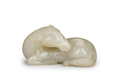 A pale celadon jade figure of a recumbent horse Late Ming dynasty | 晚明 青玉臥馬