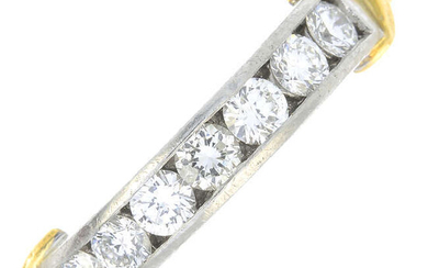 A platinum brilliant-cut diamond seven-stone ring.
