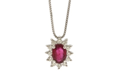 A ruby and diamond pendant set with a ruby encircled by numerous diamonds, mounted in 18k white gold, on an 18k white gold necklace. (2)
