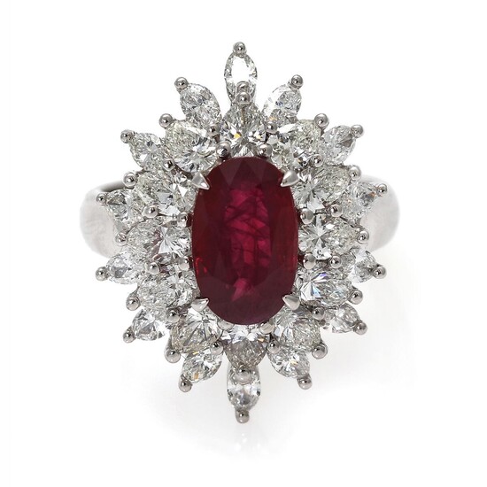 NOT SOLD. A ruby and diamond ring set with a ruby weighing 2.99 ct. encircled by numerous diamonds, mounted in platinum. Size 54. – Bruun Rasmussen Auctioneers of Fine Art
