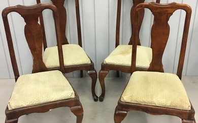 A set of four, mahogany, Queen Anne fiddle-back chair....