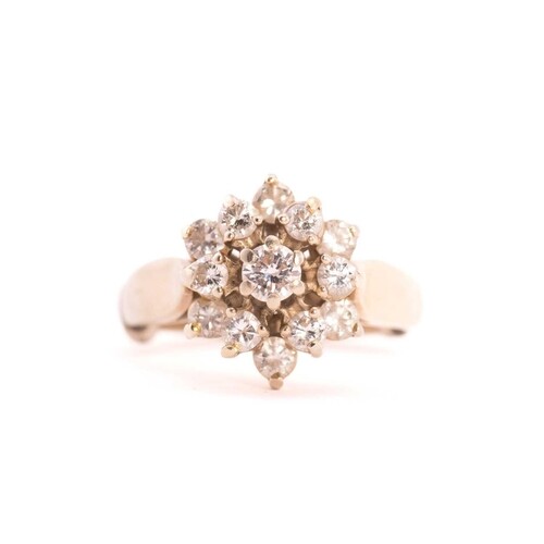 A three-tier diamond cluster ring, consisting of thirteen ro...