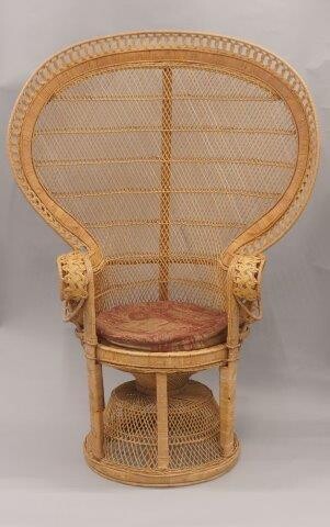 A wicker work peacock chair, second half 20th century, with loose upholstered seat cushion, 148cm high, 107cm wide.