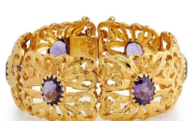 AN AMETHYST BRACELET composed of open work panels of