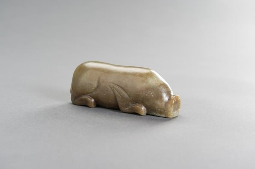 AN ARCHAISTIC CHINESE JADE FIGURE OF A PIG