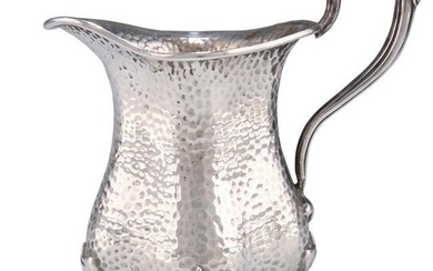 AN ARTS AND CRAFTS SILVER CREAM JUG, by Edward Souter