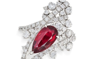 AN UNHEATED RUBY AND DIAMOND RING set with a pear cut ruby of 3.01 carats accented by round brillian
