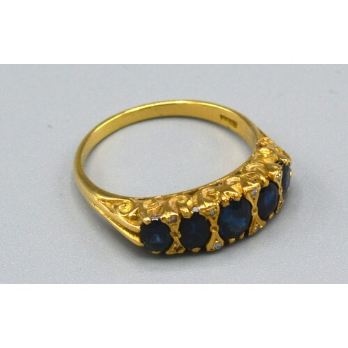 An 18ct. Gold Sapphire and Diamond Ring set with five gradua...