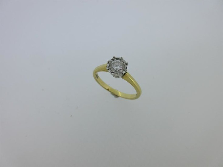 An 18ct gold single stone diamond ring