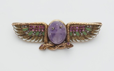 An Austrian Egyptian Revival 14k gold enamel diamond ruby and amethyst winged scarab brooch.