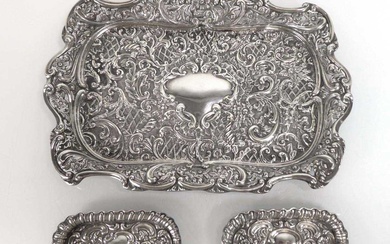 An Edwardian silver and repousse decorated tray of rectangular form,...