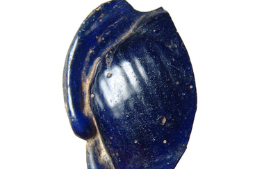 An Egyptian blue glass inlay of a bird