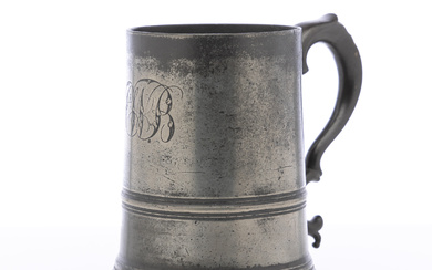 An antique English monogrammed large pewter tankard with boldly scrolled...