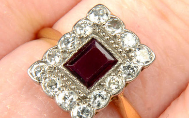 An early 20th century 18ct gold ruby and brilliant-cut diamond cluster ring.