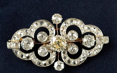 An early 20th century platinum and gold old and rose-cut diamond brooch.Principal diamond estimated