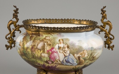 An earthenware jardiniere with bronze frame decorated with a pastoral scene, marked V.B. France, 19th...