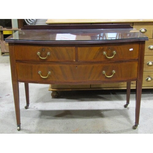 An inlaid Edwardian mahogany bow fronted dressing/side table...