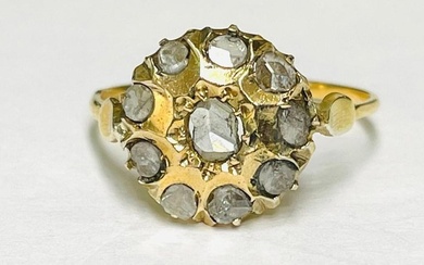 Antique 18 kt gold ring. <br>Features 10 rose cut diamonds...