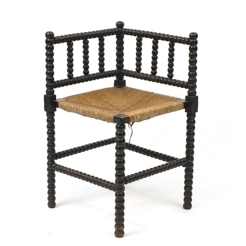 Antique bobbin turned corner chair with rush seat, 68cm high