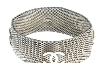 CHANEL - a silver mesh bracelet. Designed as a