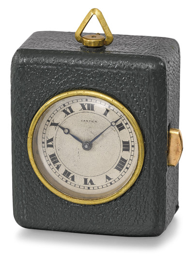 Cartier. A fine leather-covered gilt brass minute repeating keyless lever travel desk clock, SIGNED CARTIER, “PENDULE DE VOYAGE À RÉPÉTITION”, NO. 124'511, THE MOVEMENT SIGNED EUROPEAN WATCH & CLOCK CO. INC., CIRCA 1920