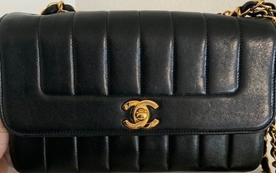 Chanel - Vertical quilted Timeless Shoulder bag