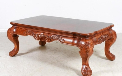 Contemporary walnut carved coffee table