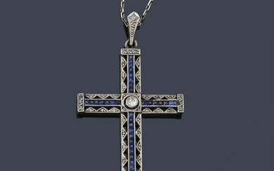 Cross with calibrated sapphires and diamonds in