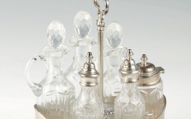 Cruet in argento 800 e vetro a forma di navetta,... - Lot 557 - Pierre Bergé & Associés