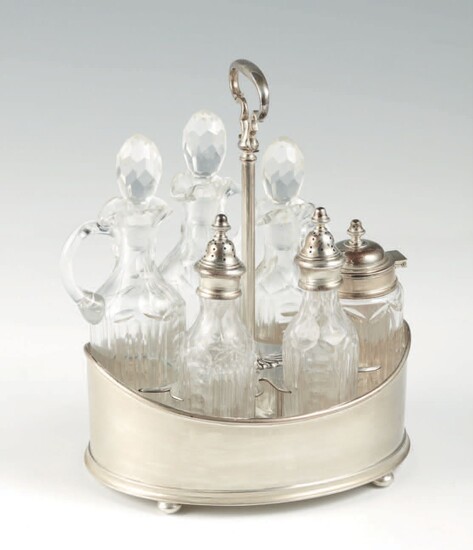 Cruet in argento 800 e vetro a forma di navetta,... - Lot 557 - Pierre Bergé & Associés