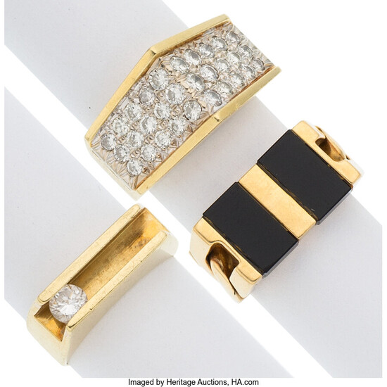 Diamond, Black Onyx, Gold Rings The lot consists of...