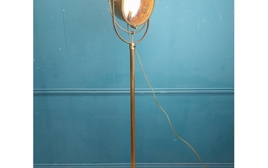 Early 20th C. brass search light on cast iron base. {186 cm ...